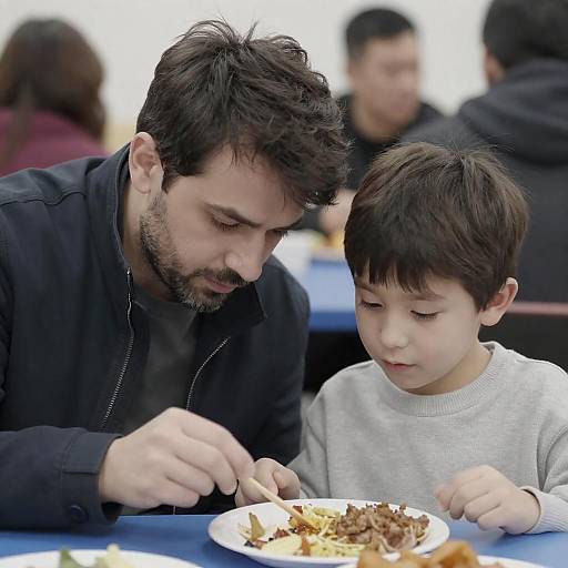 Candid Moment: Man and Boy Dining Together