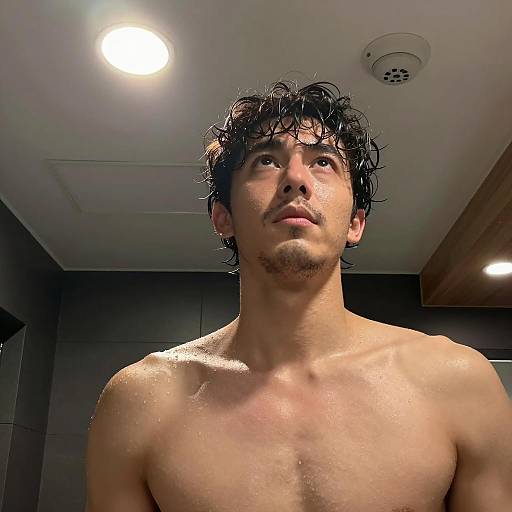 Shirtless Man in Dramatic Lighting