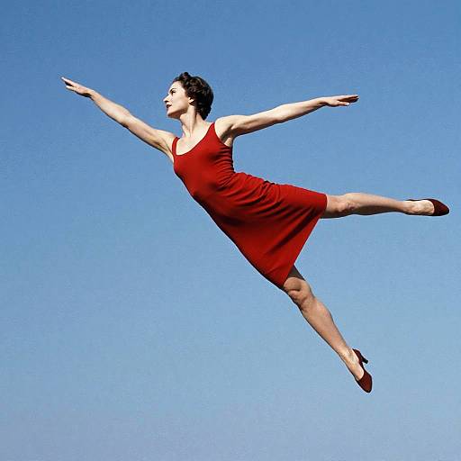 Model in Red Dress Leaping