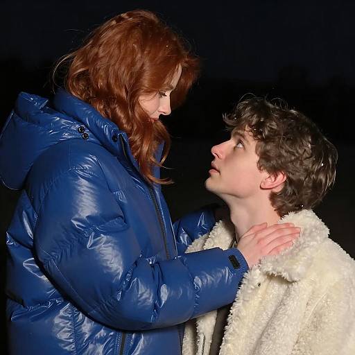 Couple Looking at Each Other at Night