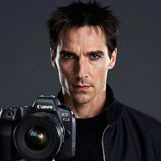 Portrait of Man with Professional Camera