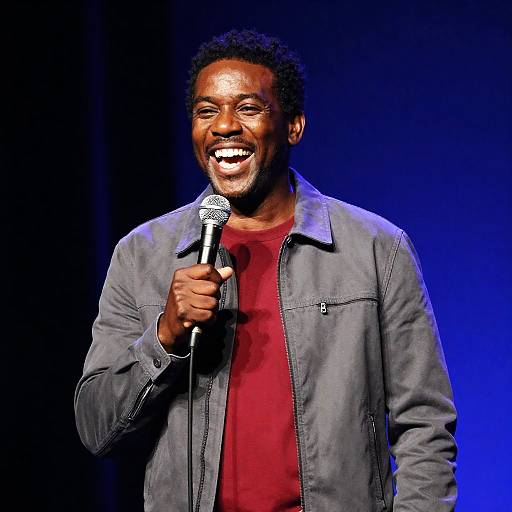 Joyful Speaker on Stage with Microphone