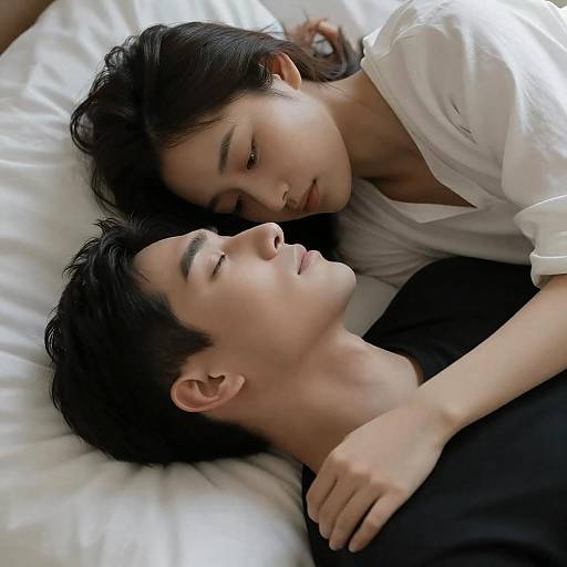 Intimate Couple Lying on Bed