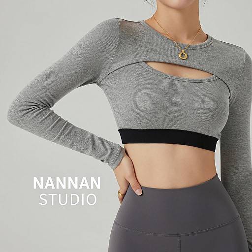 Woman in Gray Crop Top and High-Waisted Pants