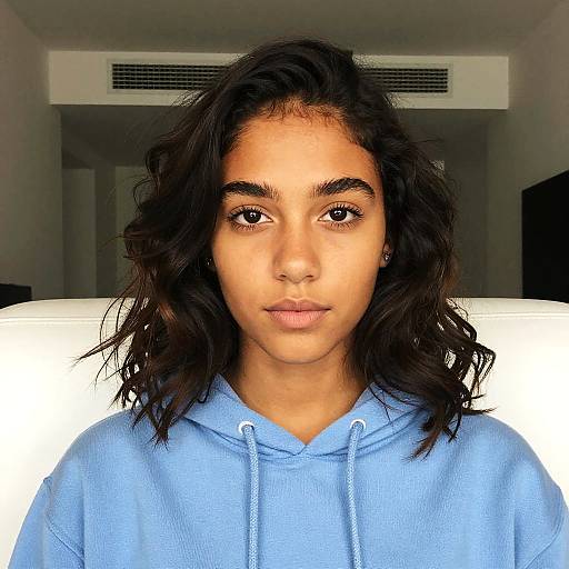 Portrait of Young Woman in Hoodie