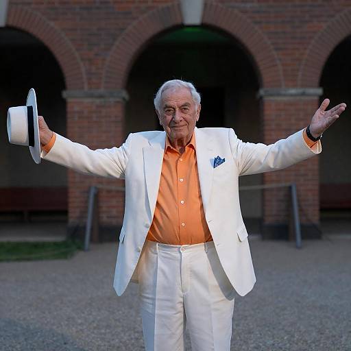 Cheerful Elderly Man in White Suit