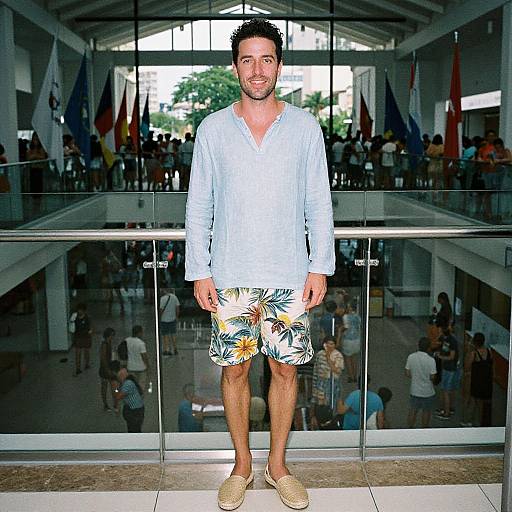 Man in Tropical Style by Glass Facade
