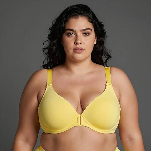 Confident Plus-Sized Woman in Yellow Bra