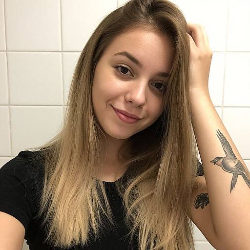 Casual Blonde Woman with Bird Tattoo