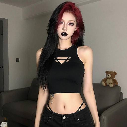 Gothic Woman in Dimly Lit Room