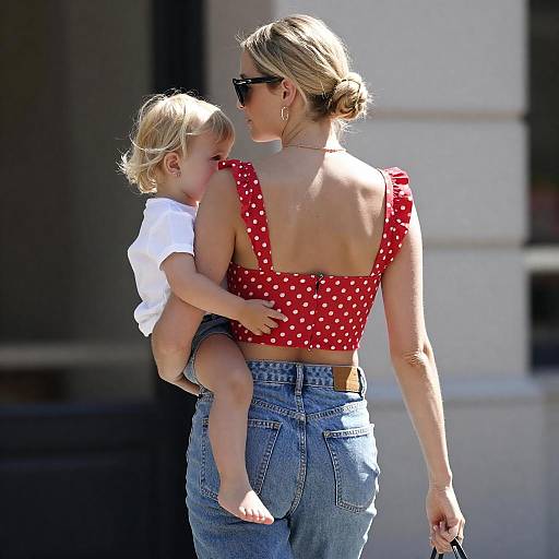 Blonde Woman Walking with Child Outdoors