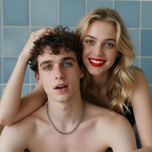 Joyful Couple Portrait with Blue Background