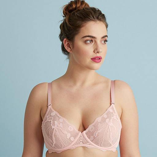 Woman in Pink Lace Bra on Blue Background