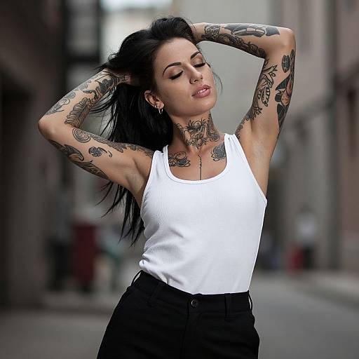 Edgy Tattooed Woman in Urban Setting