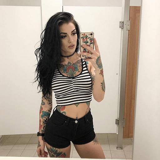 Tattooed Woman Mirror Selfie