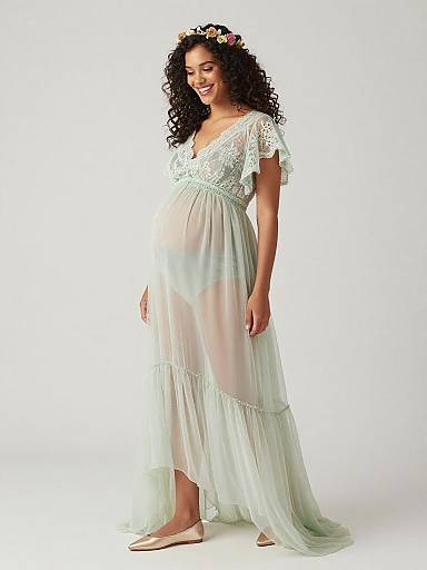 Pregnant Woman in Ethereal Maternity Dress