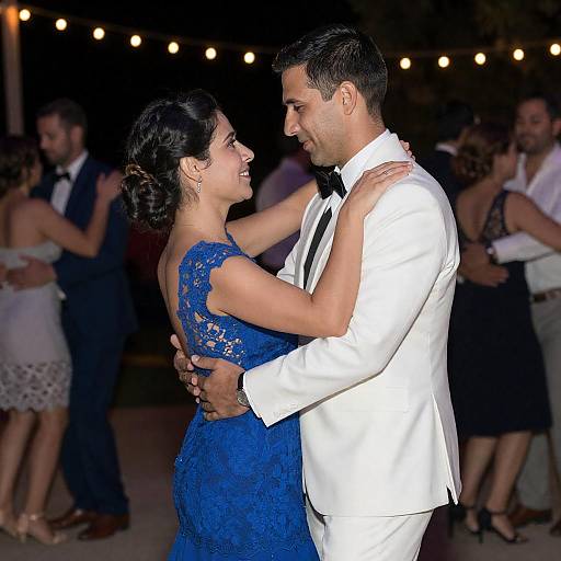 Couple Dancing Under String Lights