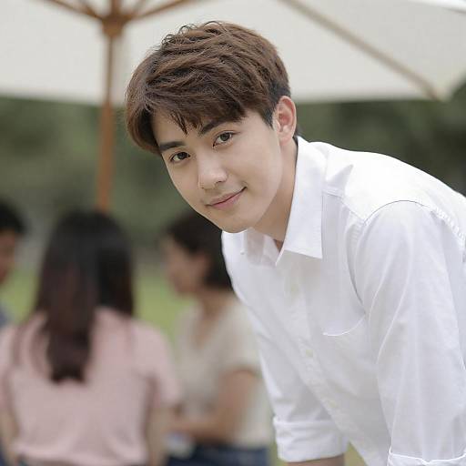 Young Man Leaning Forward, Slight Smile