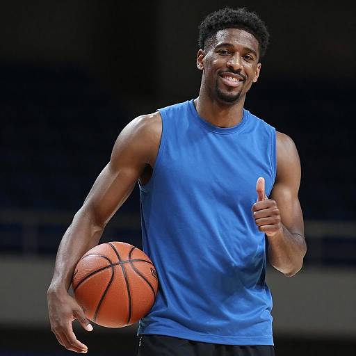 Smiling Basketball Player with Thumbs Up