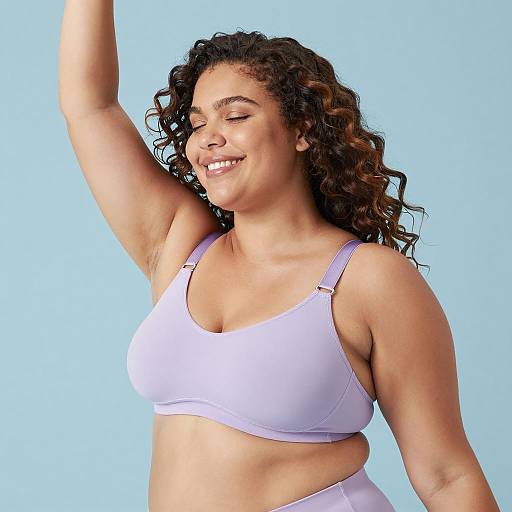 Joyful Plus-Size Woman in Purple Bra