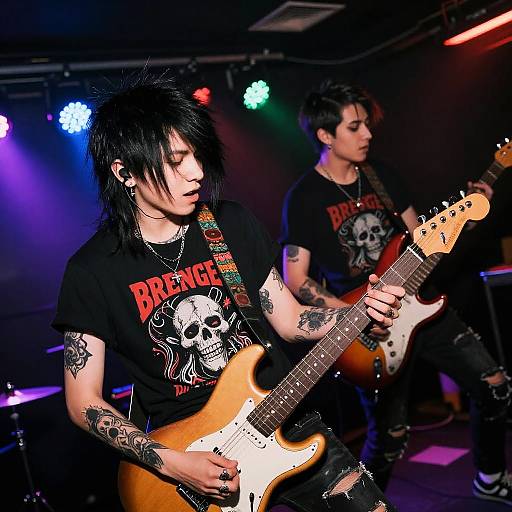 Emo Boys Playing Electric Guitars in Underground Club