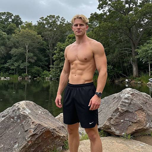 Muscular Man by Rocky Forest Pond