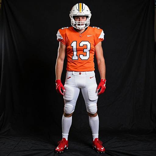 Male Football Player in Orange Jersey