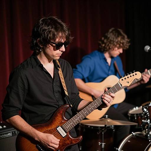Three Musicians Performing on Dim Stage
