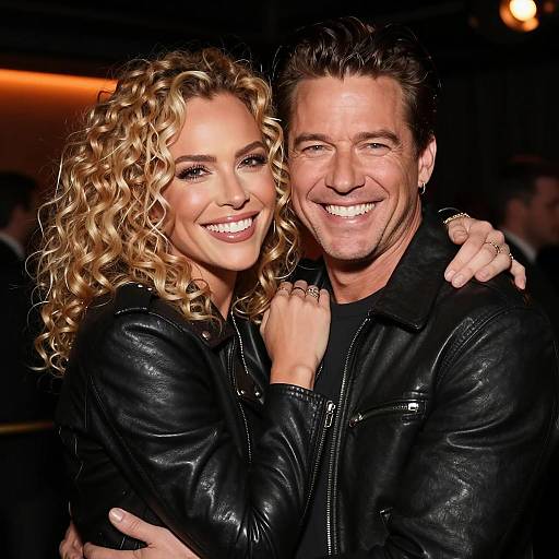 Joyful Couple in Leather Jackets