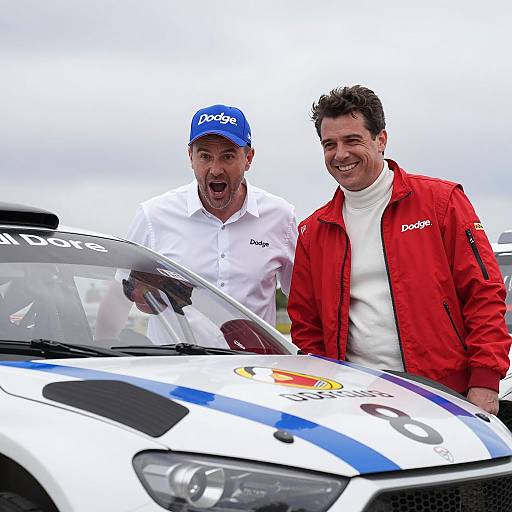Excited Duo with Rally Car Under Clouds