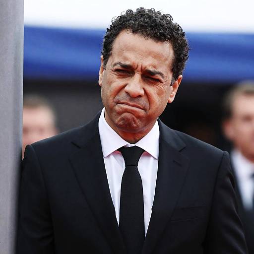 Focused Middle-Aged Man in Suit