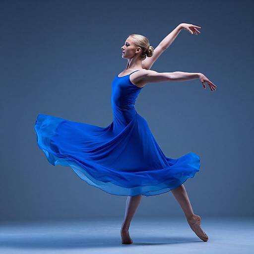 Photograph of a blonde ballerina in a flowing blue dress, gracefully posing against a gradient blue background, arms elegantly extended.