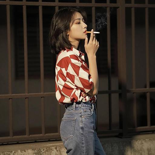 Young Woman in Geometric Shirt Profile