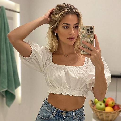 Blonde Woman Taking Mirror Selfie