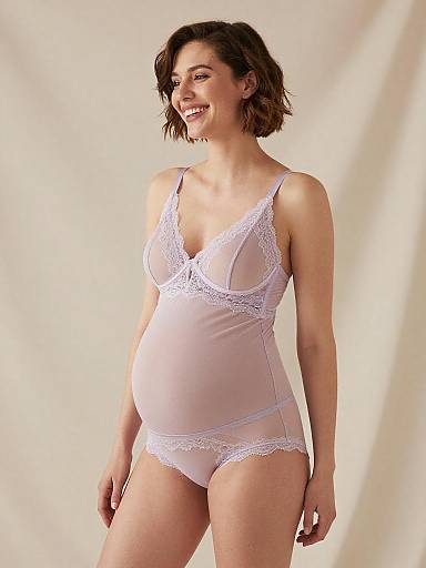 Pregnant Woman in Lilac Maternity Lingerie