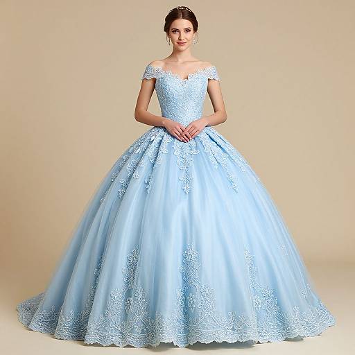 Photograph of a slender woman with fair skin and dark hair in an off-shoulder, light blue, lace-embellished ball gown,