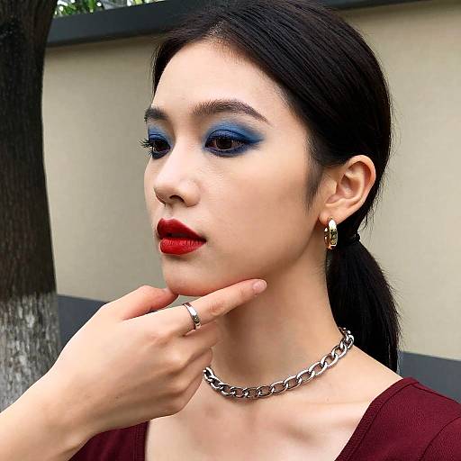 Portrait of Elegant Asian Woman Outdoors