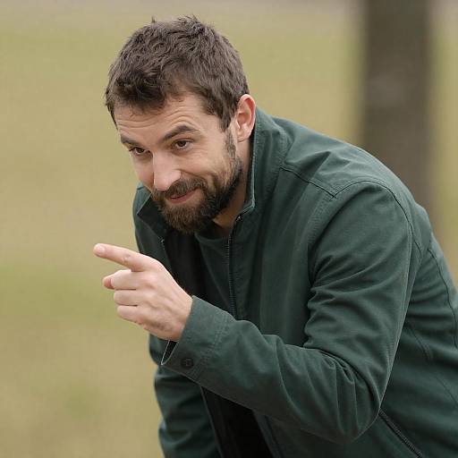 Engaging Man Pointing Outdoors Portrait