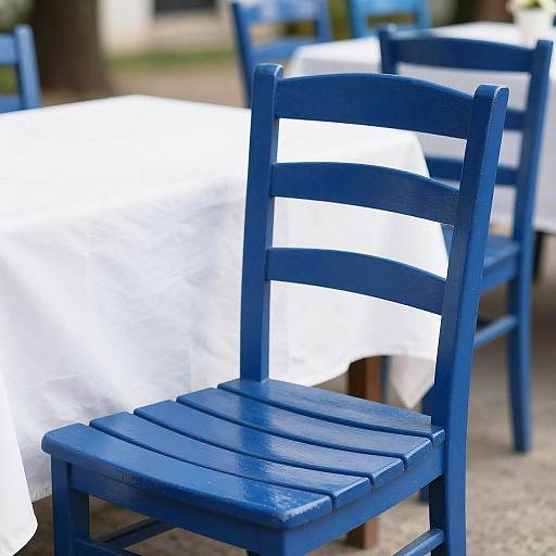 Blue Wooden Chair by White Tablecloth