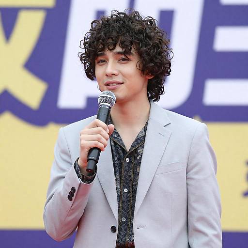 Stylish Young Man with Microphone