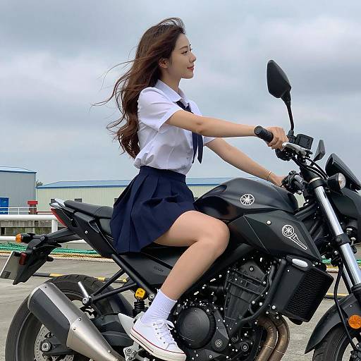 Woman on Black Yamaha Motorcycle