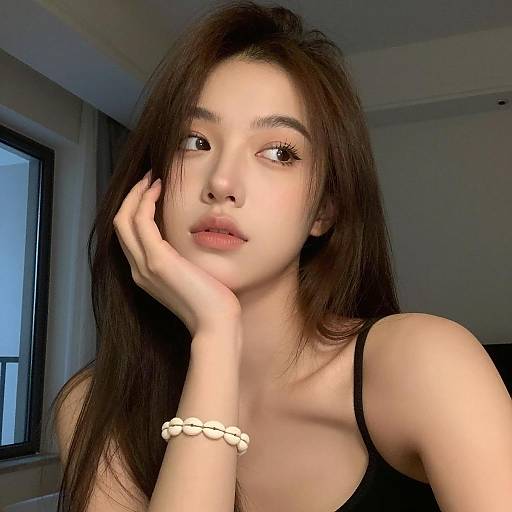 Young Woman with Shell Bracelet