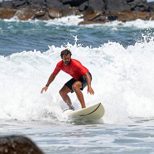 Surfer Riding Stormy Coastal Waves
