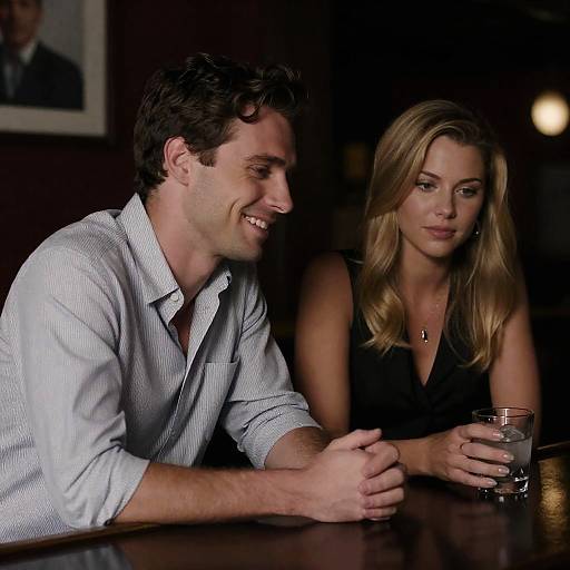 Man and Woman in Dimly Lit Bar
