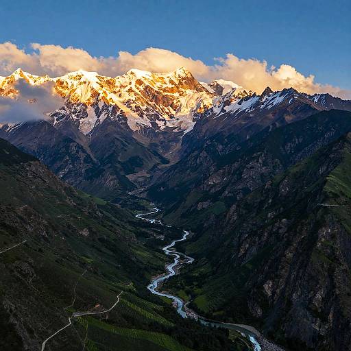 Golden Sunrise Over Snowy Mountains