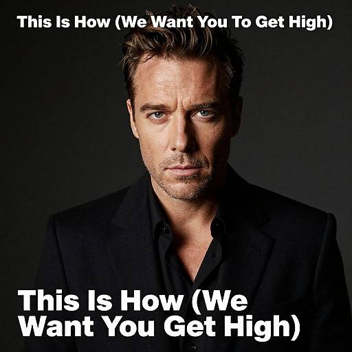 Photograph of a serious-looking, middle-aged white man with short brown hair, wearing a black suit, against a dark background. Text above and below