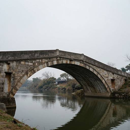 Ancient Arched Bridge Between Earth and Sky