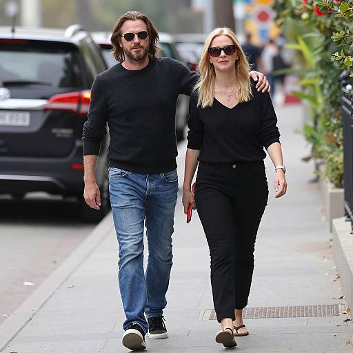 Couple Strolling on a Sidewalk