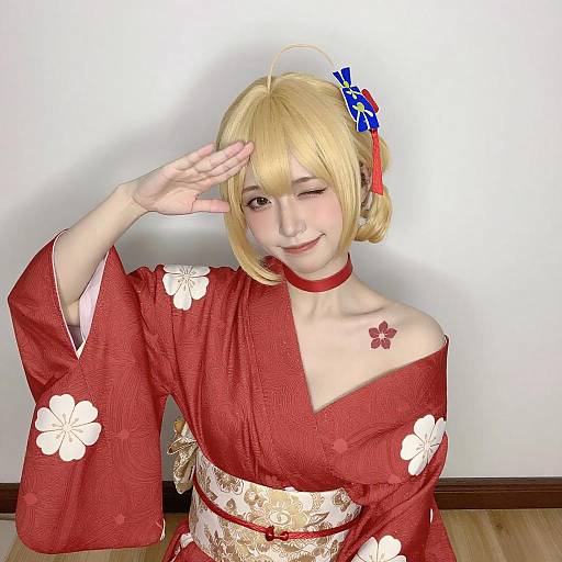 Playful Blonde Cosplayer in Red Kimono
