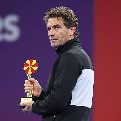 Man Holding Golden Flower Award